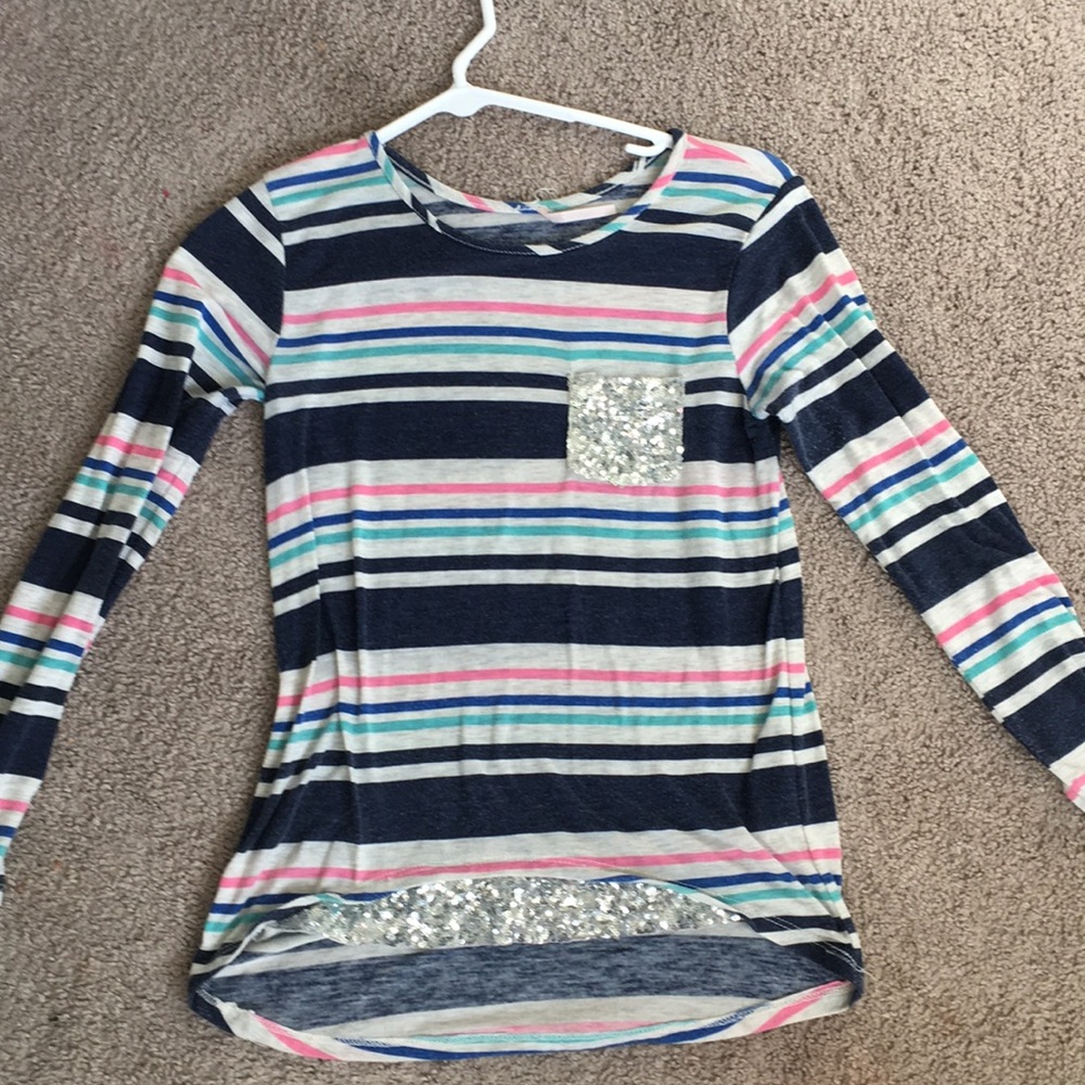 A long sleeve striped shirt with sequins